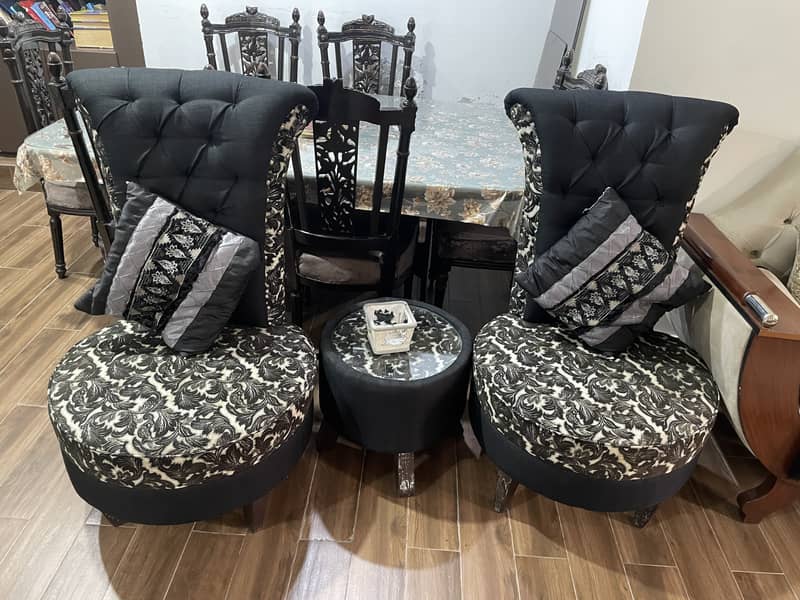 A pair of black high-back tufted accent/Sofa chairs with table 5