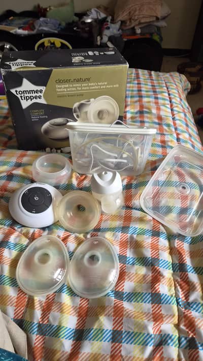 Tommee Tippee Closer to Nature Electric Breast Pump + other itemsl