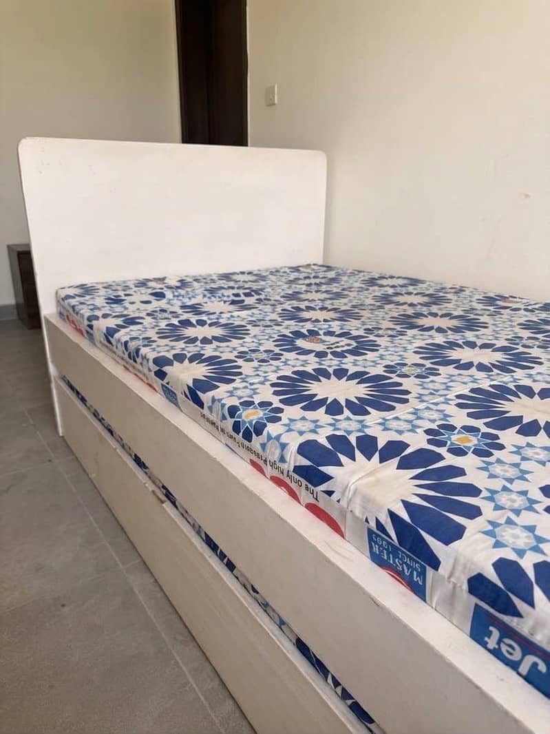 Single  bed with pull out trundle bed 2