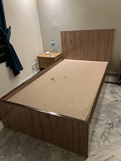 2 single beds with 2 side tales without mattress