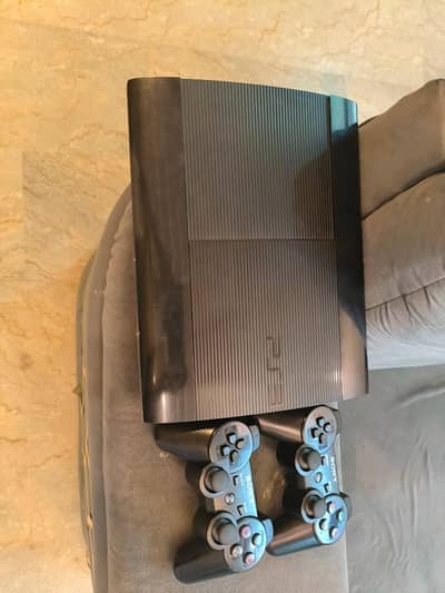 Playstation 3 Super Slim with 2 controllers