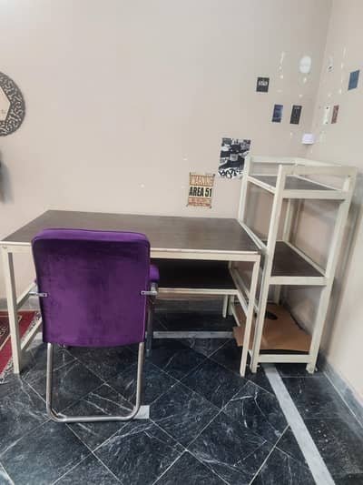 Wooden study table and cupboard with complementary chair