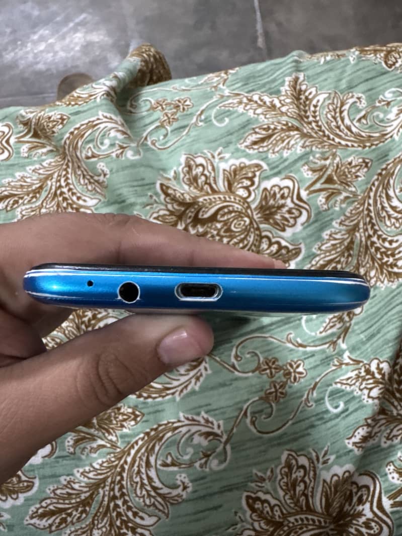 Tecno Spark 4 Lite 5