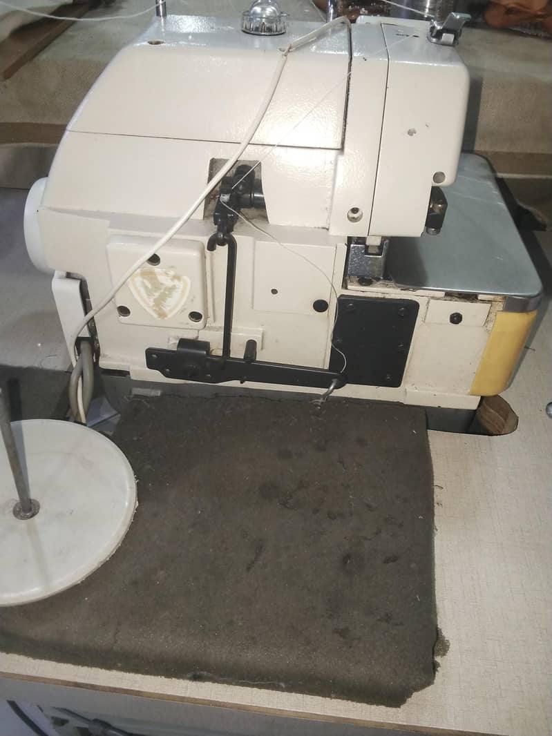 over lock machine. 100%ok 2