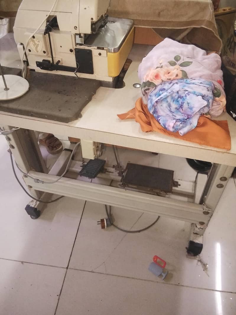 over lock machine. 100%ok 3