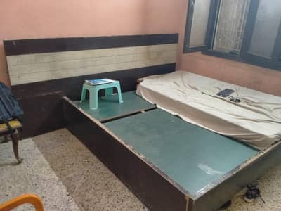 king size bed without mattress and 3 door wardrobe