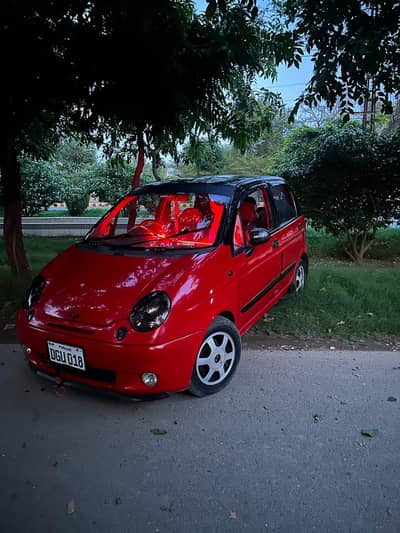 Chevrolet Joy 2006 Red wine lush Condition o3oo-6oo6667