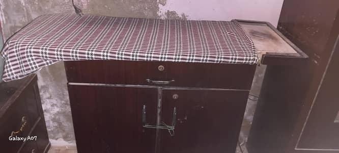 Wooden iron stand with storage cabinet