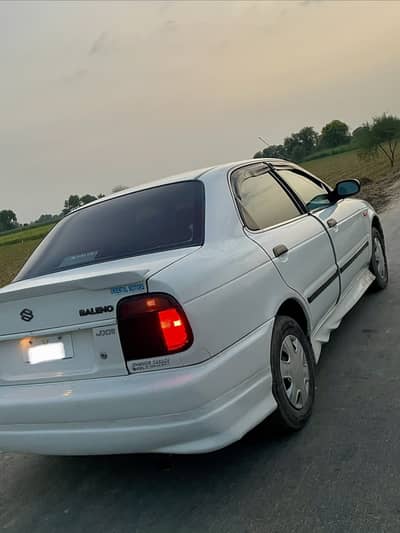 Suzuki Baleno JXR 2005 Diggi bonnet chaat Genian andr sy Total janian
