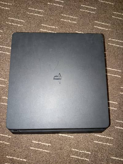 PS4 slim 500GB for sale with 3 games and 2 controllers