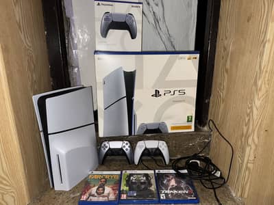 Playstation 5 slim disc version with two controllers and 3 games