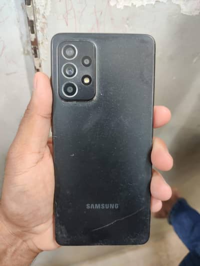 Samsung Mobile A52s 5g  8/128 back broken slightly