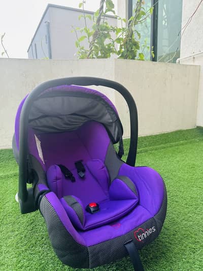 Tinnies comfortable and secure baby carrier and car seat