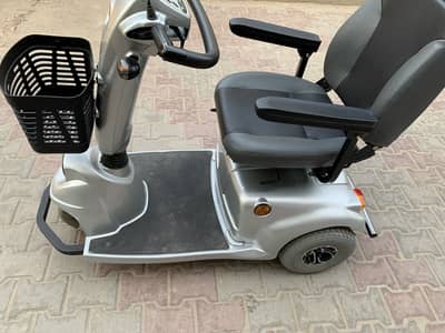 Scooty three wheeler