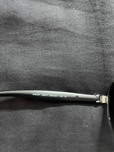 Aviator polarised Ray Ban driving sunglasses or original Prada