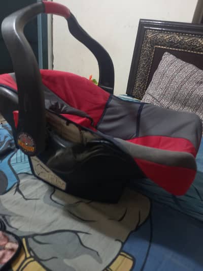 Baby carry cot.