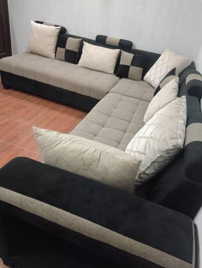 6 seater l shape sofa with beautiful cushions