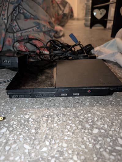 PS2 slim (9000 version best one) w steering wheel