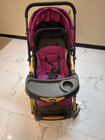 IMPORTED QUALITY BABY STROLLER/ PRAM WITH FOOD TRAY- FOLDABLEFOR SALE.