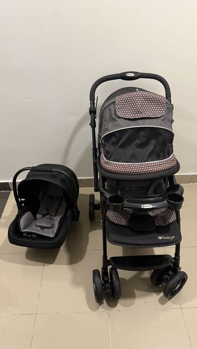 Baby stroller plus carry cot attachment