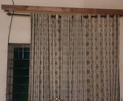 Curtain for sale in a good condition with wood and stylish Jeller