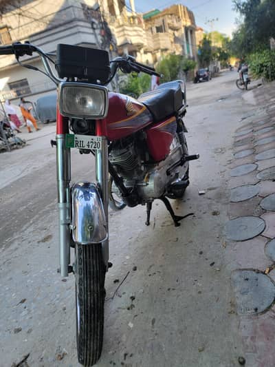 Honda 125 2011 Model , Non Euro Silver silencer.