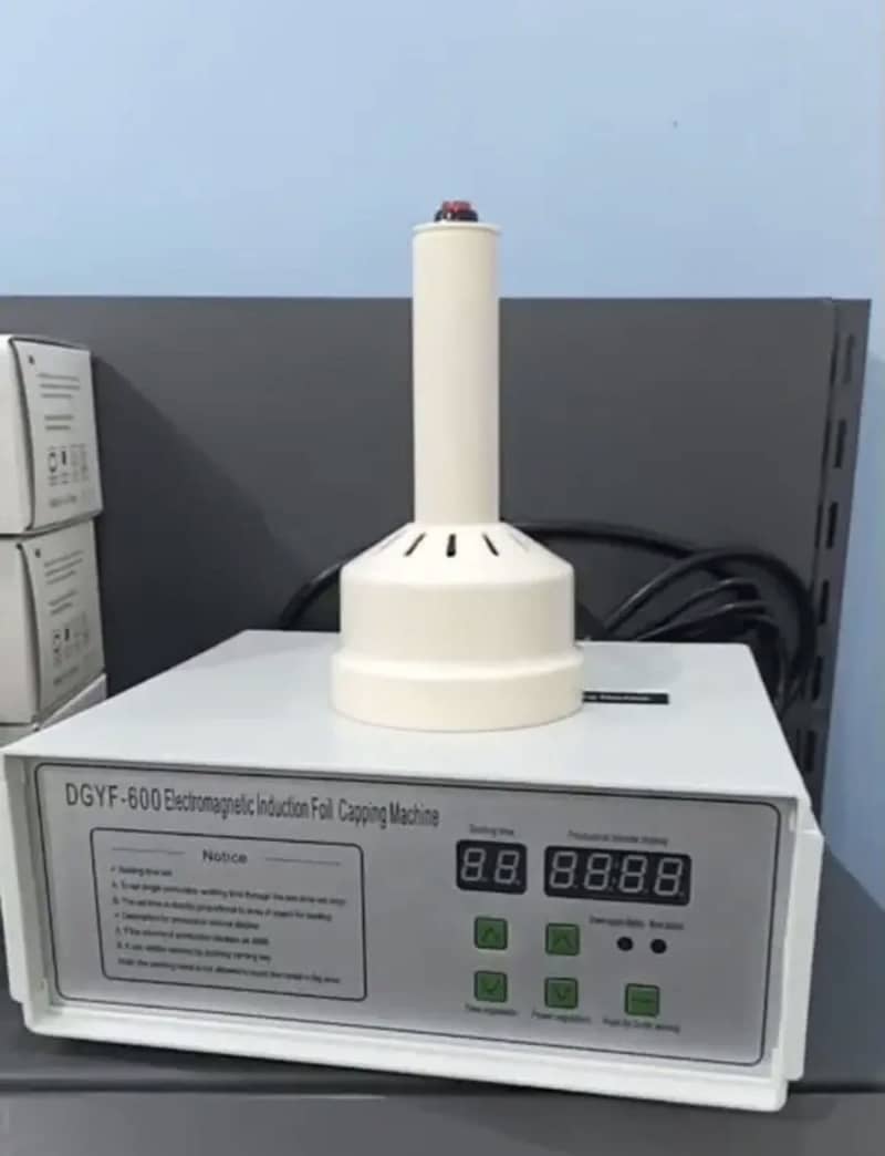 Electromagnetic induction foil capping machine 1