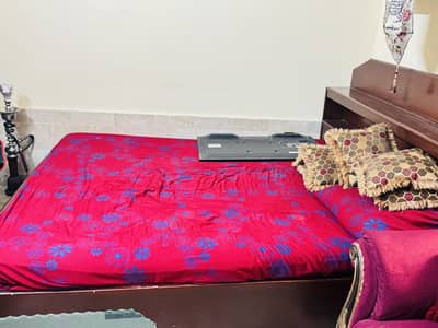 Bed with mattress.