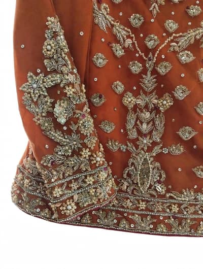 Heavy Embroidered Rust Lehenga Choli - Mehndi / Barat - 1 Time Used