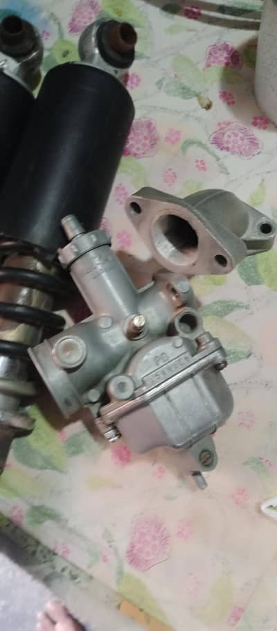 shakh genuine united ka ha carburetor 125 ka sath chinchi flench tyar