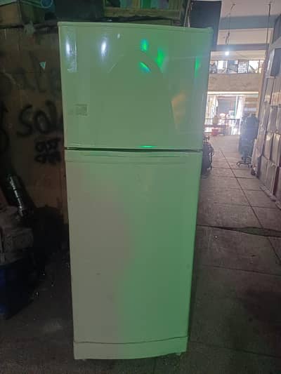 dawalnce fridge running good condition available