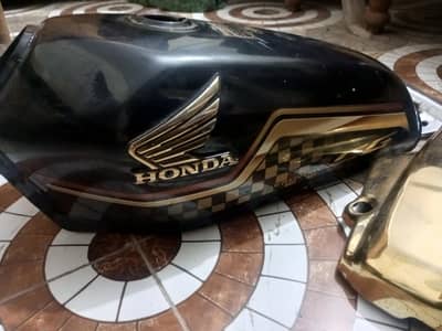 125 fuel tank side covers