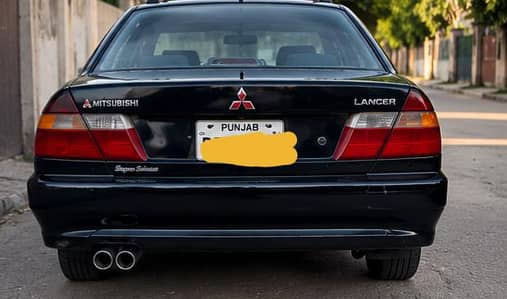 Mitsubishi Lancer Super saloon 1300cc