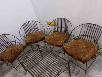 iron chairs with table