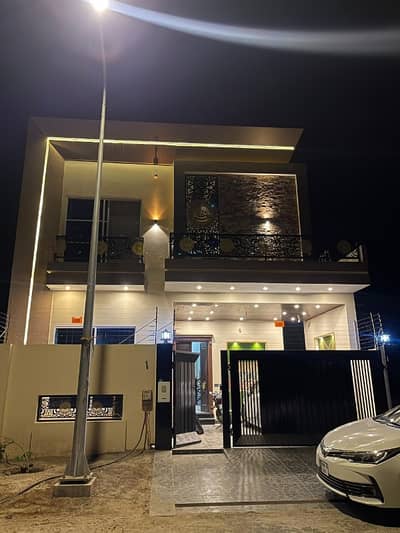 DHA sector V 8 marla house available ideal location 5 bed attach bath