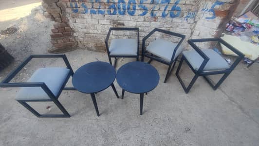 8 Chairs and 2 Tables