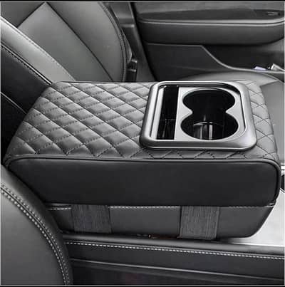 Car Armrest with cup holders.