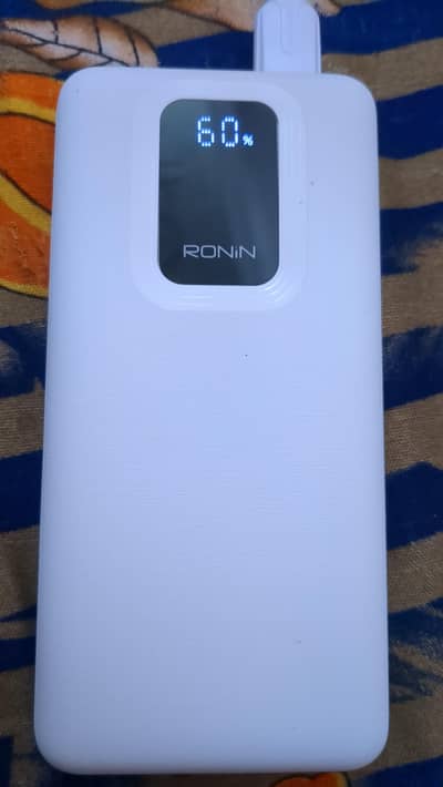Ronin new 20000 power bank 1 year company warranty just 3 days used.