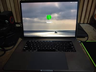 Apple MacBook Pro 15.4-inch Touch Bar & Touch ID almost new condition.