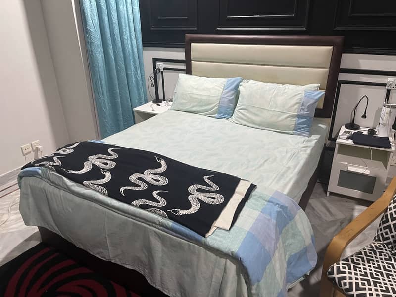 Bed with single side table 0
