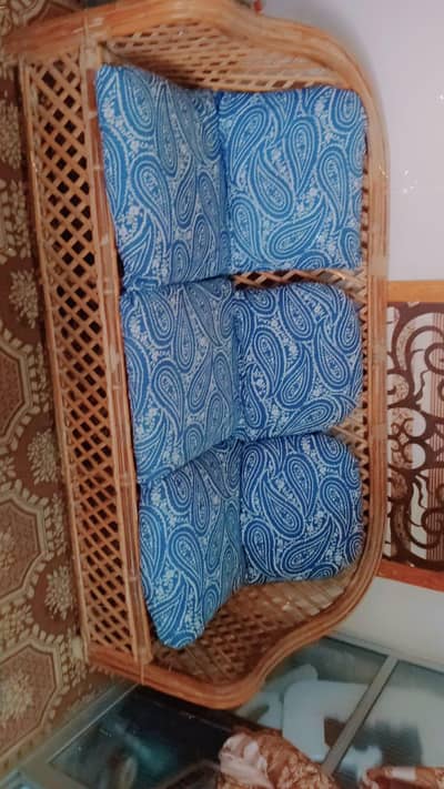 cane sofa