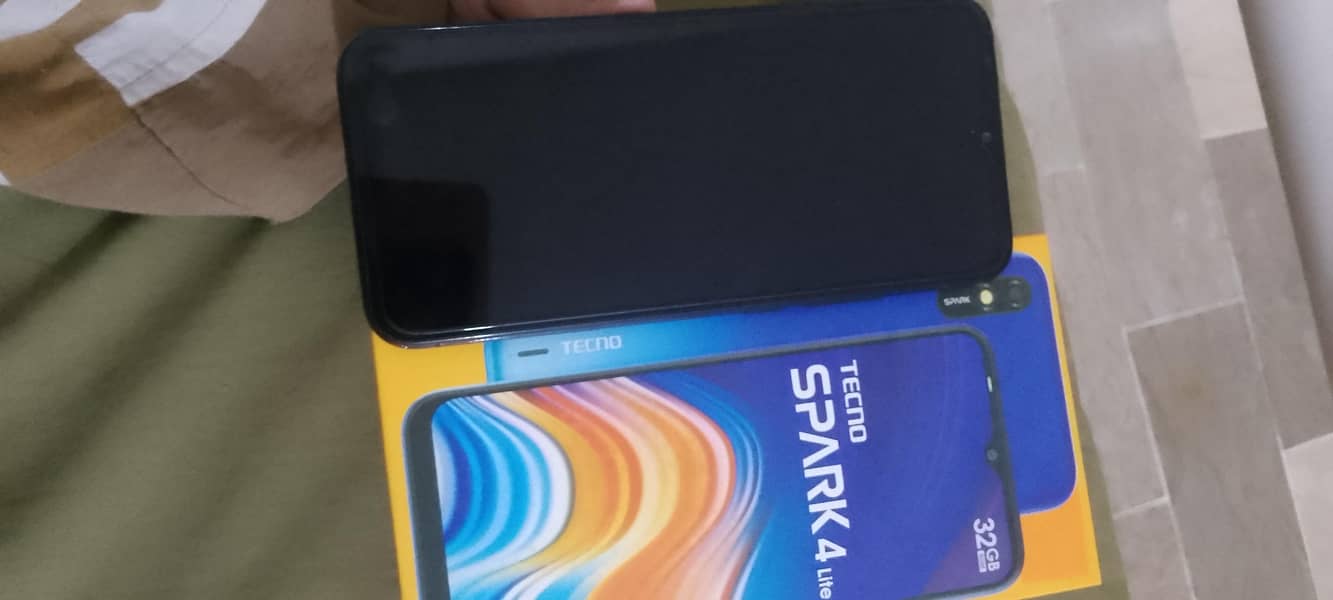 Tecno Spark 4 Lite 0