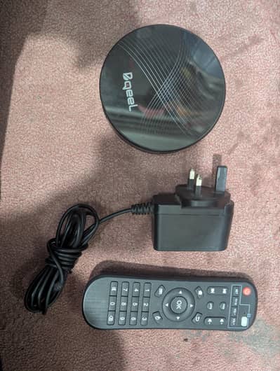 Bqeel UI MAX Android TV box (4gb ram/128 gb rom) with remote and power