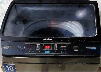 Haier Automatic washing and dryer machine.
