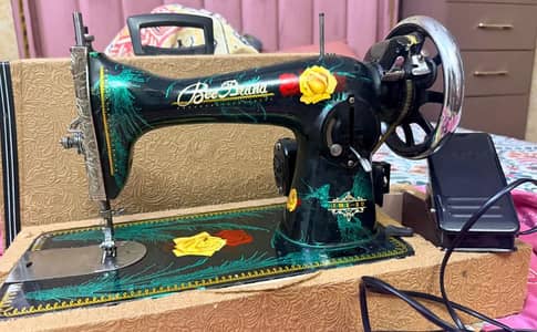 a little used sewing machine in ok condition