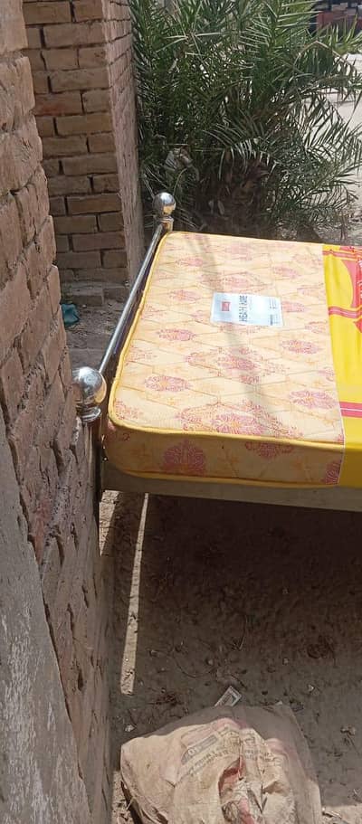 double bed and mattress