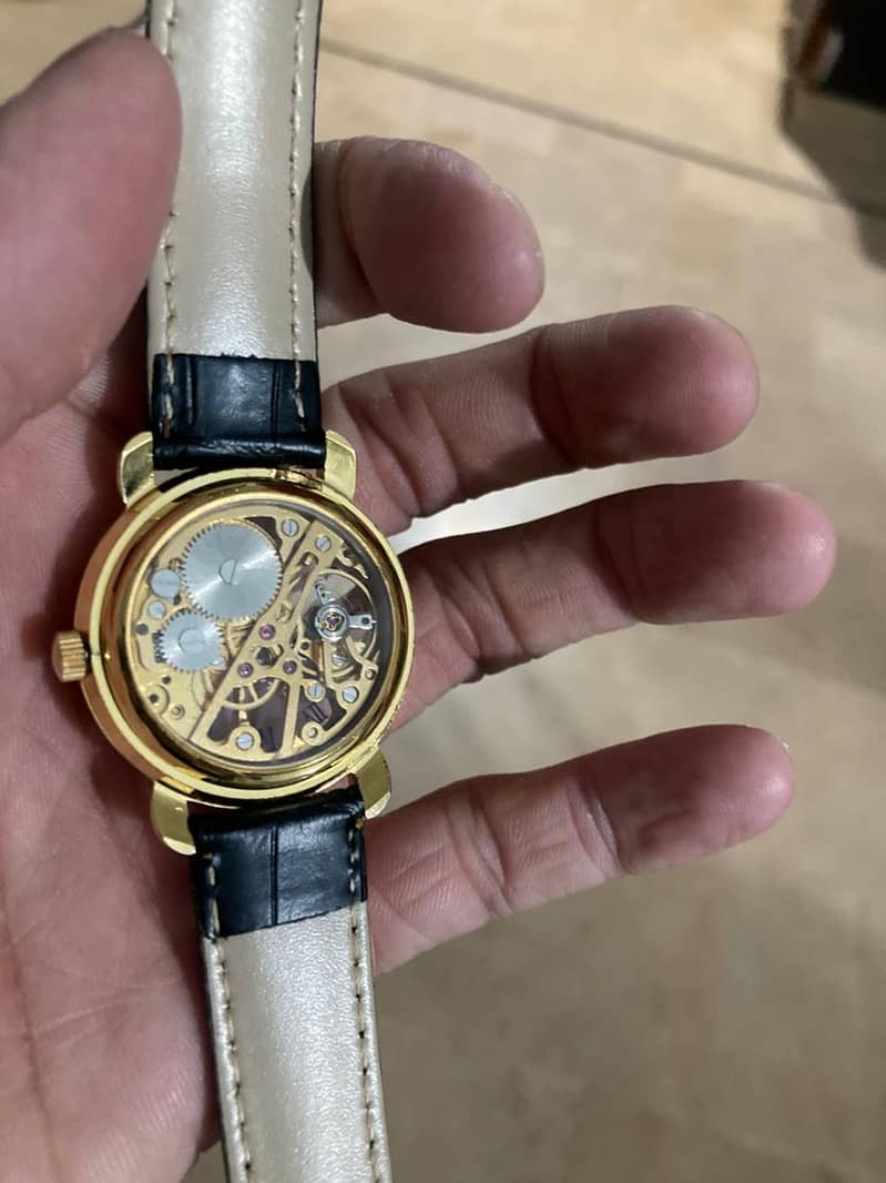 Hand winding automatic watch 10/10 1