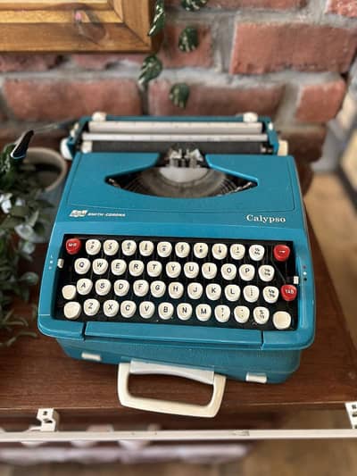 With 6 month Warranty Olympia Typewriter, Paper Shredder, Laminator