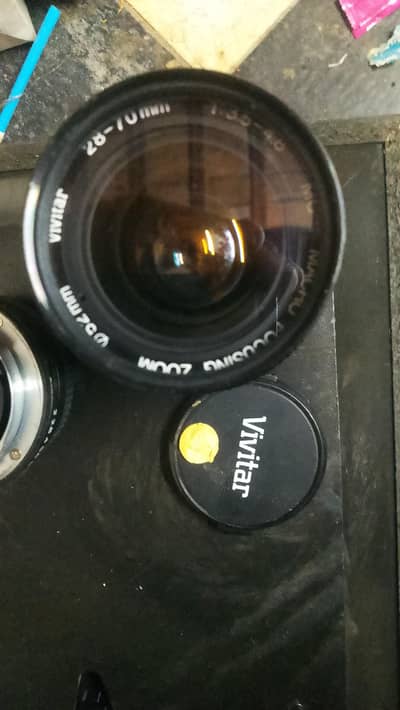 2lens available photax and vivitar