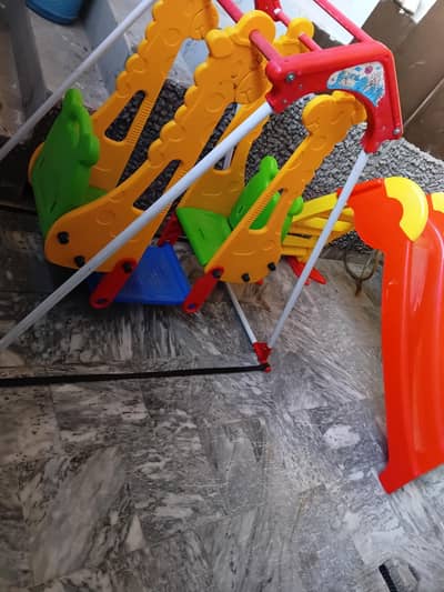 KIDS DOUBLE SIDE SWING AND SLIDE NEAT AND CLEAN